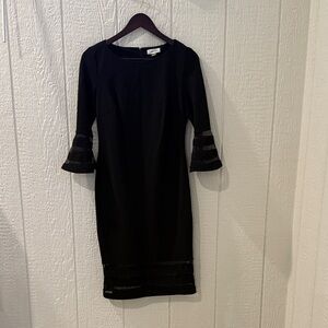 Elegant Black Dress with Sheer Accents by Calvin Klein